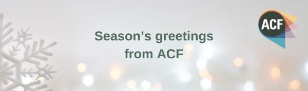 Festive wintry background with ACF logo. Wording: Season’s greetings from ACF