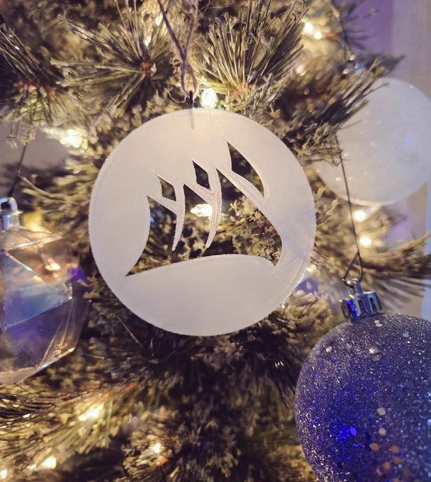 A shot of my Christmas tree, displaying a Corsair ornament in white!
