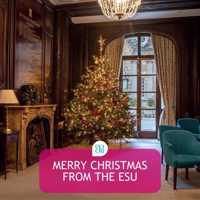 A photo of a Christmas tree inside Dartmouth House with a text overlay saying 'Merry Christmas from the ESU'