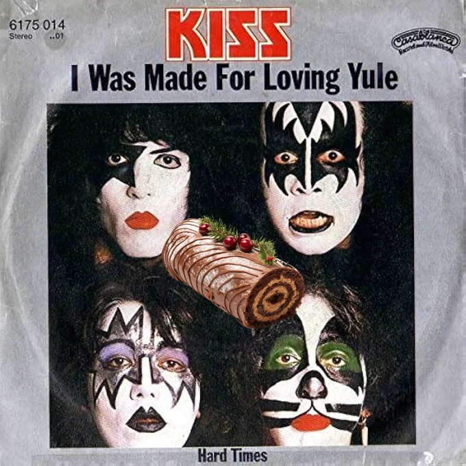 The vinyl cover for I Was Made For Loving You by KISS, photoshopped to read I Was Made For Loving Yule. A Yule log has been added to the cover artwork.