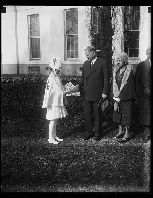 President Hoover buying Christmas Seals.