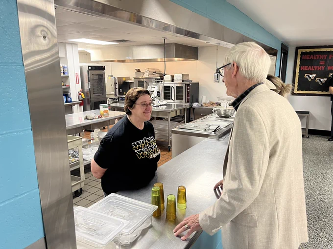 Gov. Evers talks to lunch staff