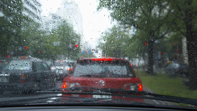 A car stuck in traffic on a rainy day 