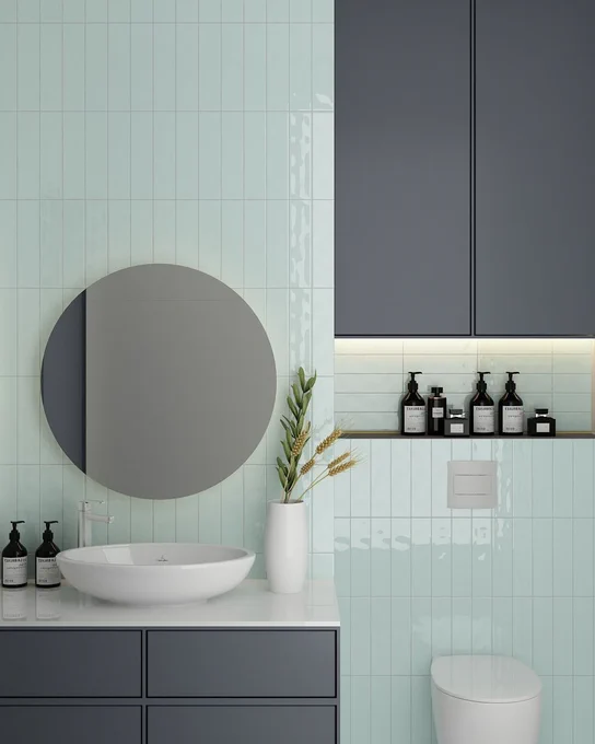 Glazed porcelain subway tiles in a blue green colour. Set in a vertical stacked tile pattern shown in a modern bathroom. Texture, 3D tile effect, contemporary, feature wall, ideas, inspiration, wall tiles.