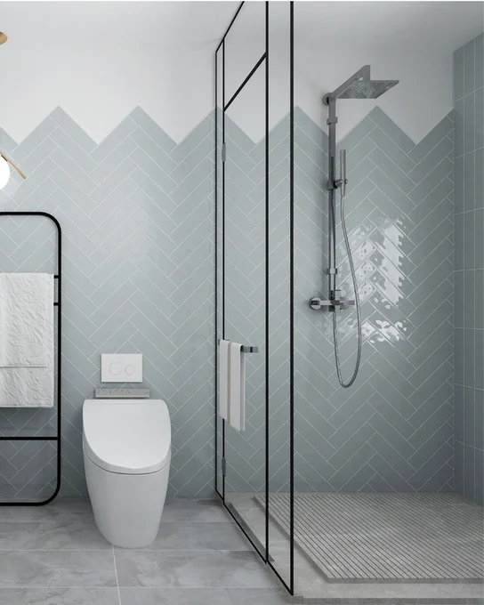Rippled, wavy blue subway tiles set on a feature wall in a bathroom and shower. The tile pattern is unique and eye catching.