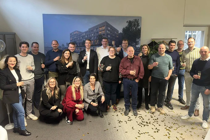 Image shows the Lister Buildings team in Amsterdam celebrating the Yardi "go live".