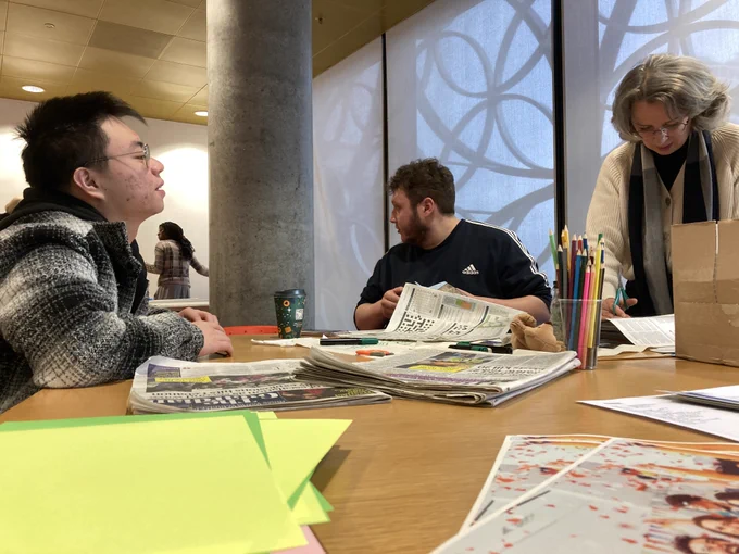 Attendees work together creating mood boards