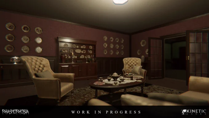 Screenshot showing a work in progress update for the Bleasdale Farmhouse map from the game Phasmophobia. It shows a tea room decorated with vintage furniture and numerous wall-mounted plates.