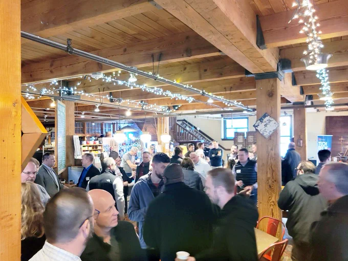 the crowd at the TAI Tech brew event
