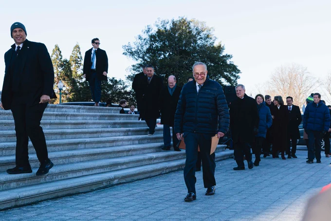 Senator Schumer and Senate Democrats walking in front of the U.S. Capitol, January 9, 2025.