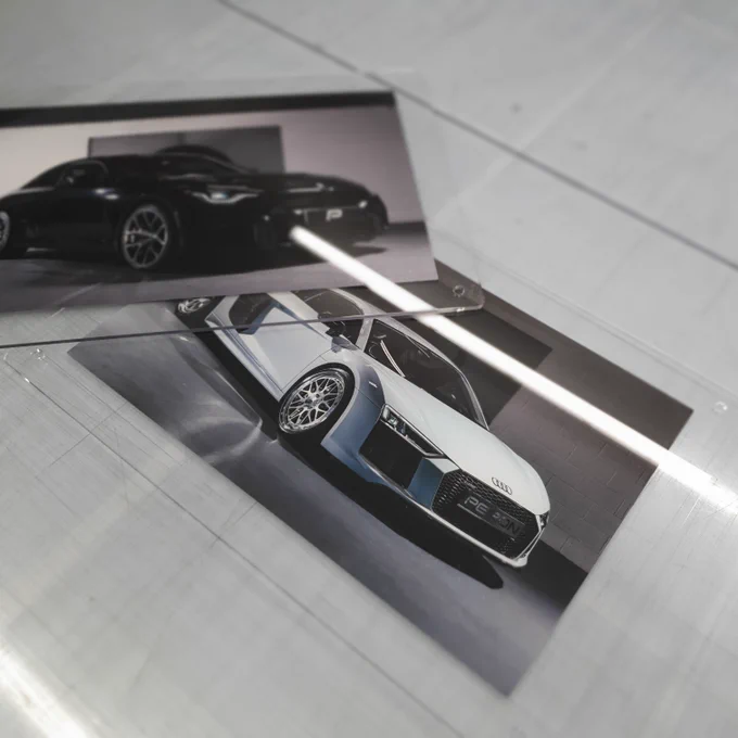 Both the black BMW M2 G87 and white Audi R8 acrylic panels.
