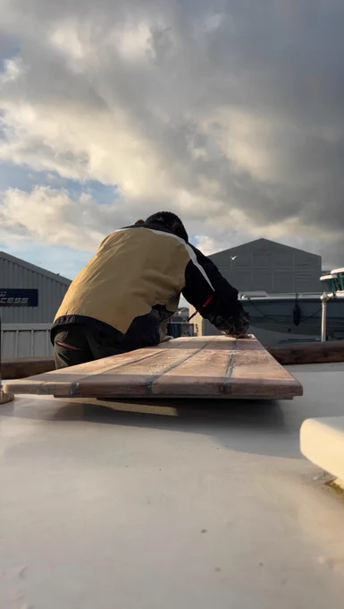 On deck sanding and getting ready for varnishing