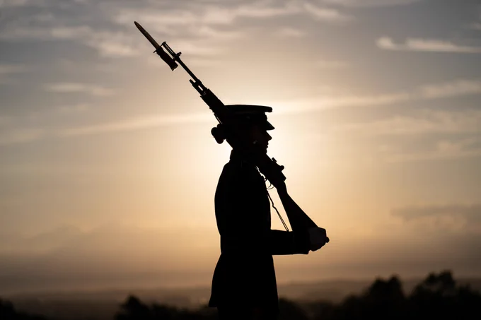 Female sentinel walks the mat at the Tomb of the Unknown Soldier.