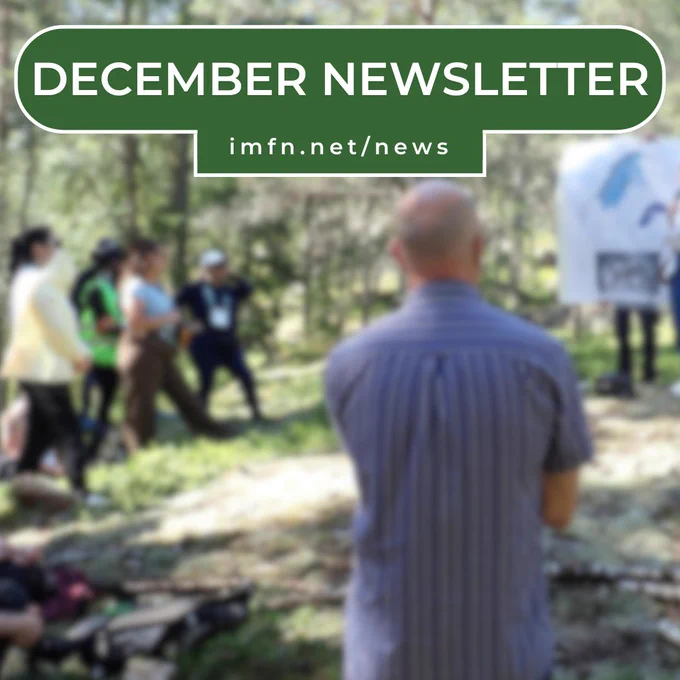Title card: December Newsletter. imfn.net/news
Group of people in a forest watching a presentation.