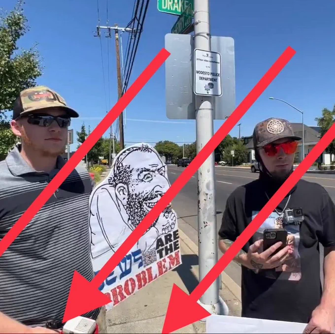 Shane Powell (left) and Ryan Petero (right) in Modesto at "Straight Pride."