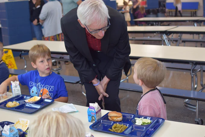 Gov. Evers talks to students at lunch
