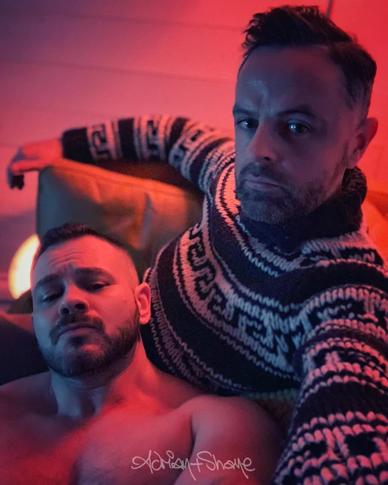 Adrian Shane relaxing on the sofa surrounded by warm red lighting. Adrian wears a heavy knot woollen jumper and Shane is topless.






#gayart #gayartists #queerart #queerartists #beards #handsome #gaymen #queermen #couple #gaycouple #boyfriends #husbands #gaybeards #hotmen #handsomemen #men #muscle #muscles #gaymuscle #hairy #hairygay #hairyguys #hairmen