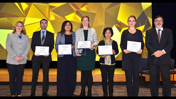 The NIH-NSF Smart Health Leadership Team is shown at the 2024 Office of Grants Workforce Recognition Ceremony with HHS Deputy Secretary, Andrea Palm and Deputy Assistant Secretary, Office of Grants, Dale Bell.