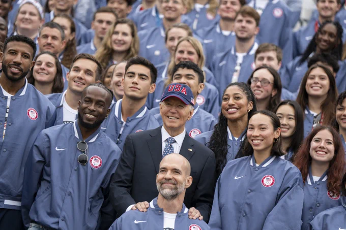 President Joe Biden poses for a group photo at an event celebrating the 2024 U.S. Olympic and Paralympic teams, on the South Lawn of the White House.