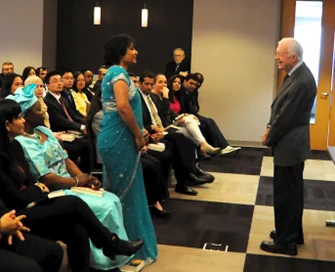 President Jimmy Carter speaks with 2014-2015 Humphrey Fellows.