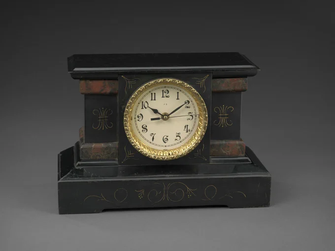 Black and brown mantle clock
