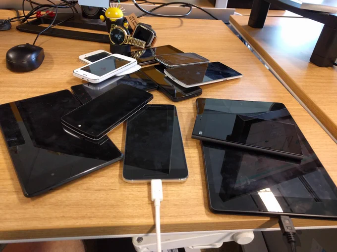 My stack of test devices for debugging the android app, watch faces, tablet mode, etc