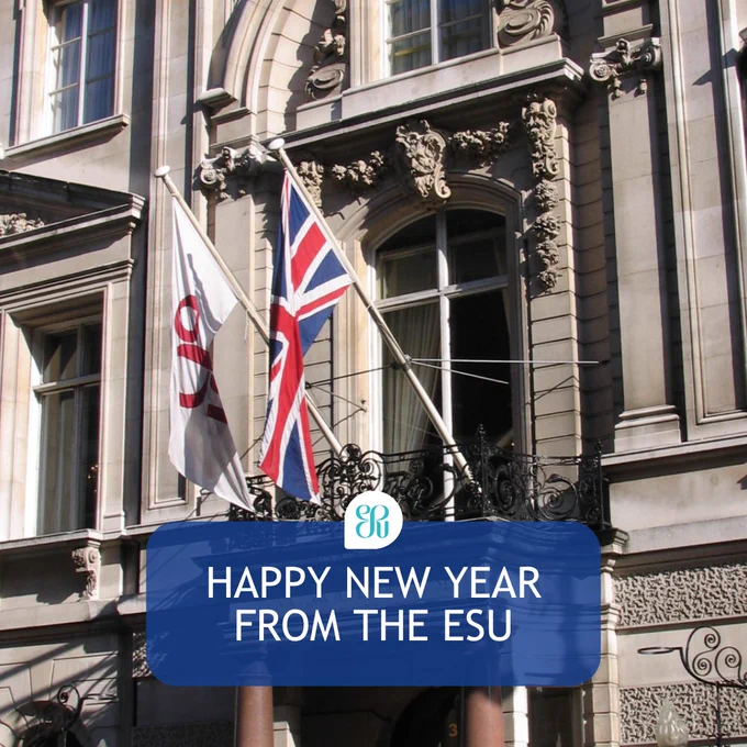 A photo of the front of Dartmouth House, London, with 2 flags and a text overlay saying, 'Happy New Year from the ESU.'