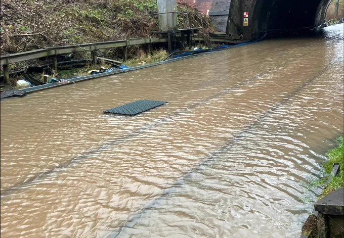A photo of the railway under flood water in Culcheth, Warrington