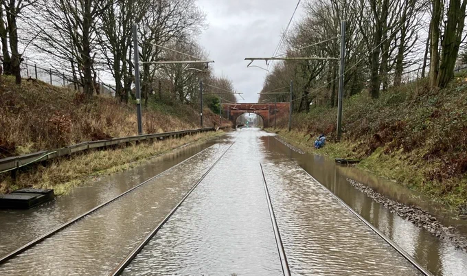 A photo of the railway under flood water in Culcheth, Warrington