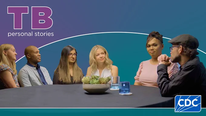 Six TB survivors sitting at a table discussing their experiences. TB personal stories