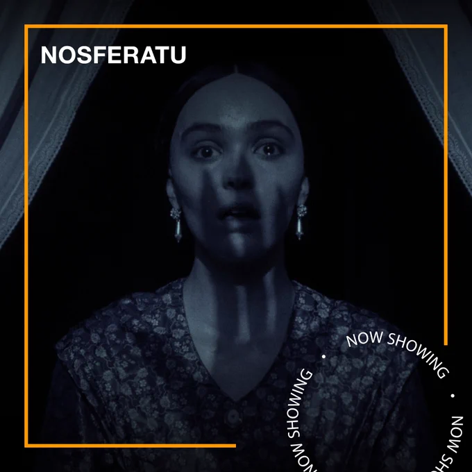 A shocked woman looks out of a window, while a dark shadow of a hand crosses across her face. Text - Nosferatu, Now Showing