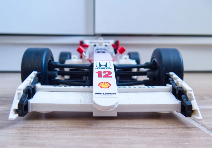 Low angle, full front end shot of a Lego version of a 1988 McLaren MP4/4 Formula One car