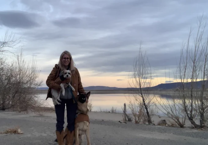 Family photo at Lahontan Reservoir at dusk. I’m holding Cardigan and Rocky is sitting next to me. We’re all wearing matching brown Carhartt coats
