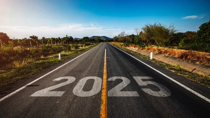 A long road with 2025 painted on the tarmac 