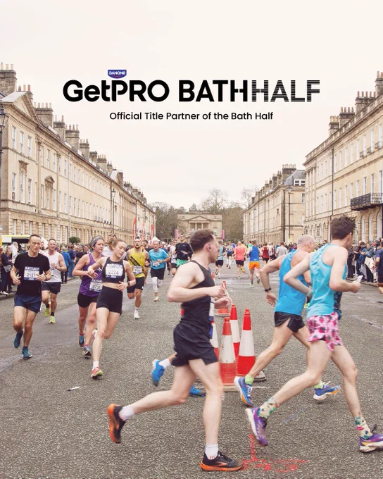 An asset promoting GetPRO as the official Title Partner of the Bath Half.

The asset features a photo of runners participating in the 2024 Bath Half, running down a street in the city.

There is a GetPRO Bath Half lock-up in the top centre of the asset. There is a line of text underneath the lock-up that reads:

"Official Title Partner of the Bath Half".