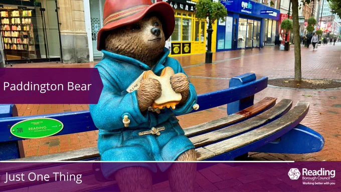 Paddington Bear statue sat on a bench in Broad St Reading holding a marmalade sandwich.

Just One Thing
RBC logo