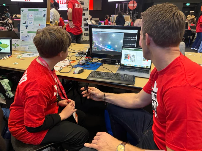 Greg Foot interviewing a young creator about their AI project