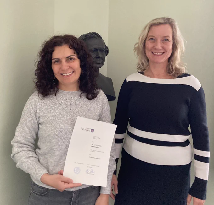 Sarela Garcia-Santamarina receives her certificate of appointment