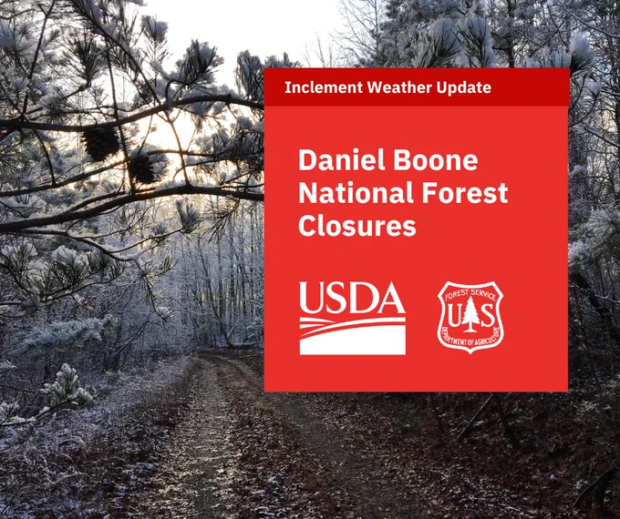 Inclement Weather Update: Daniel Boone National Forest closures. Gravel road through snowy forest.