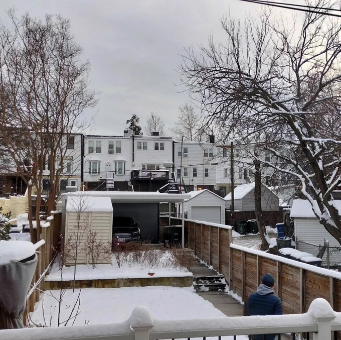 A snowy urban DC landscape.