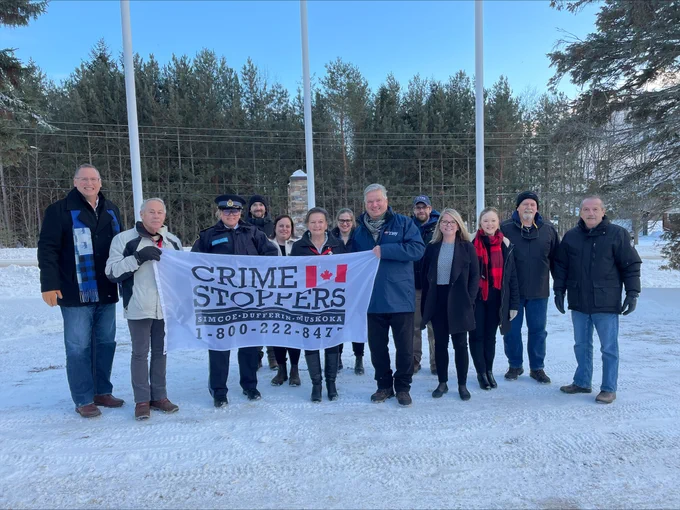 Council, staff, OPP, and Crime Stoppers at the crime stoppers flag raising at the Township of Tiny Office