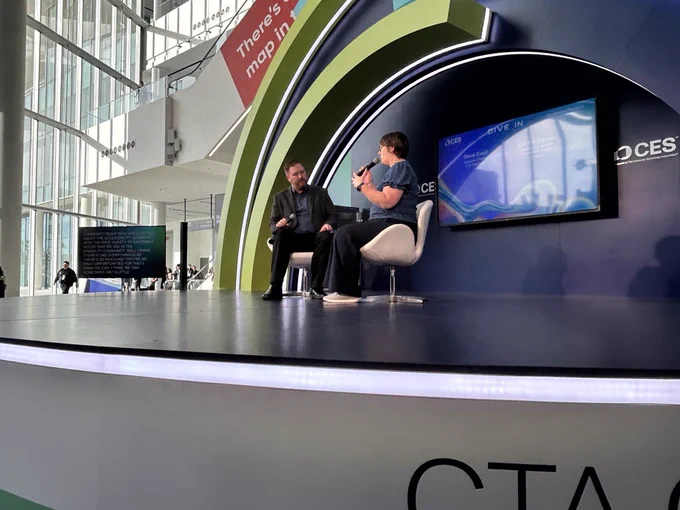 Steve Ewell, executive director, CTA Foundation, and JoAnna Hansen, head of accessibility worldwide stores, Amazon, on the CTA stage with captions