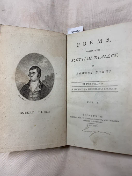A double page of a book by Robert Burns showing an image of him and the title page.  Title page and frontispiece of the first volume of Robert Burns’s  'Poems', chiefly in the Scottish dialect (Edinburgh, 1794) 
