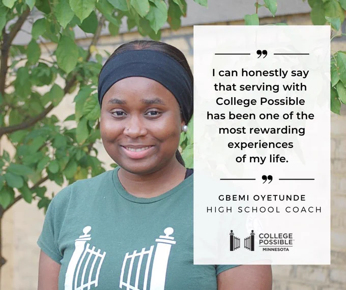 Person in a green t-shirt smiling, standing in front of a leafy background, next to a white sign with a quote about their rewarding experience as a high school coach at College Possible.