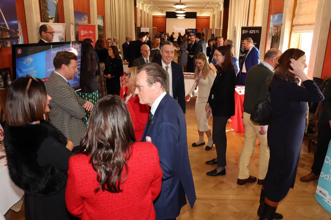 Image shows the Long Gallery filled with people.