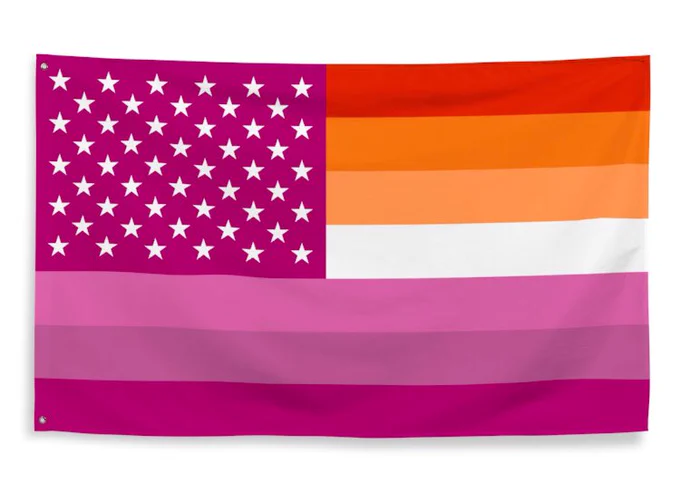 An American flag with the normal colours replaced with that of the “sunset” lesbian pride flag.