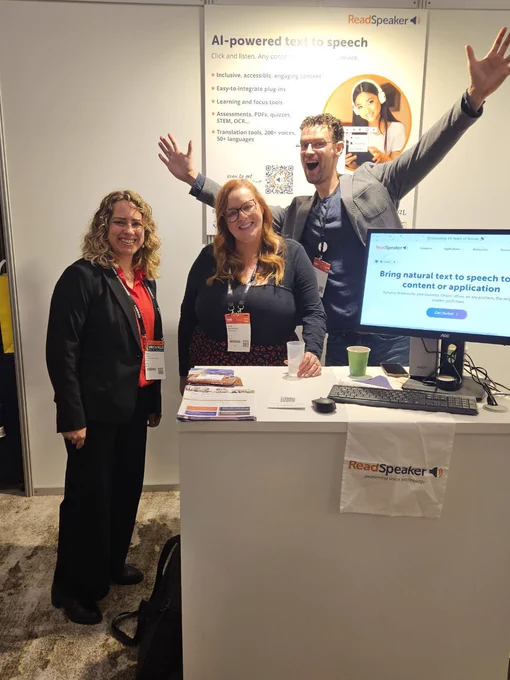 Laia Canet from Brickfield on the Readspeaker stand at OEB2024 with two of their. team.