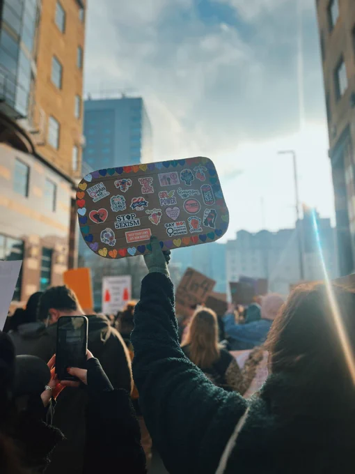Sign held up in air at protest