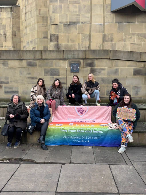 LDVS and LWA staff sat in front of LWA and LDVS banners