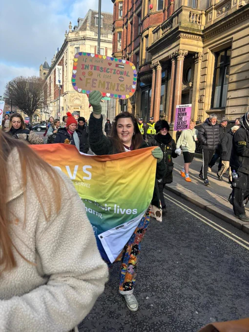 LDVS and LWA staff marching at protest with signs and banners